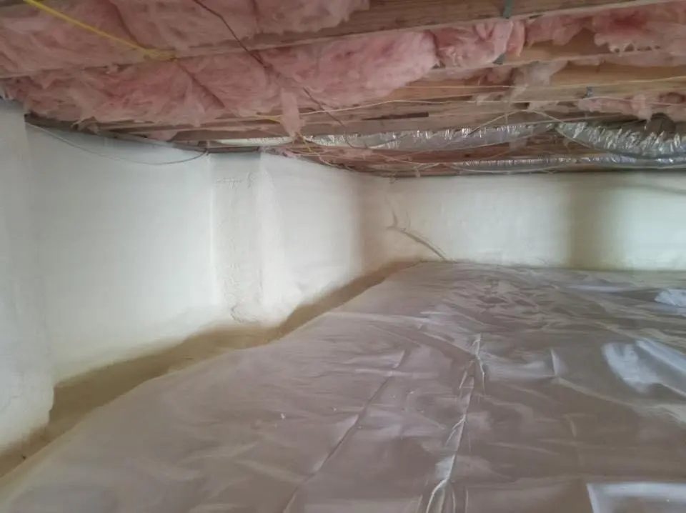 Crawl space encapsulation with closed-cell spray foam for Roof Waterproofing in Lawrence
